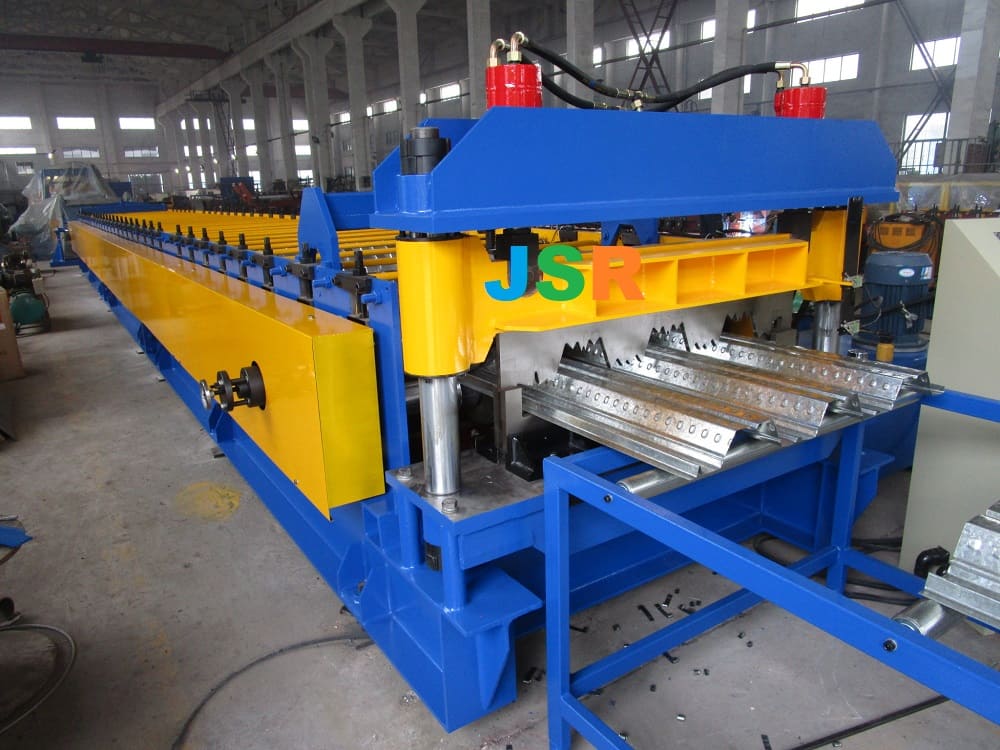 Composite metal floor deck machine